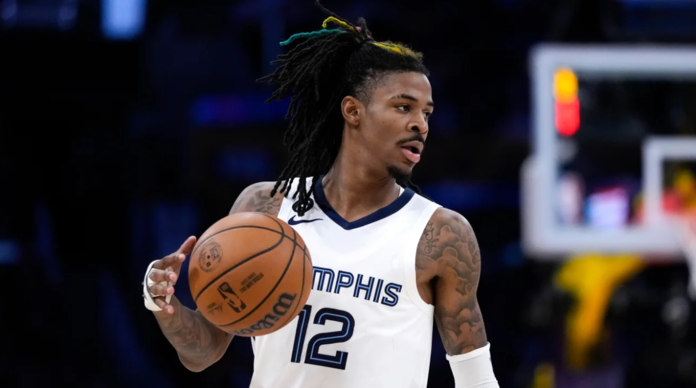 Grizzlies suspended Ja Morant after he used a flash gun on social media a second time